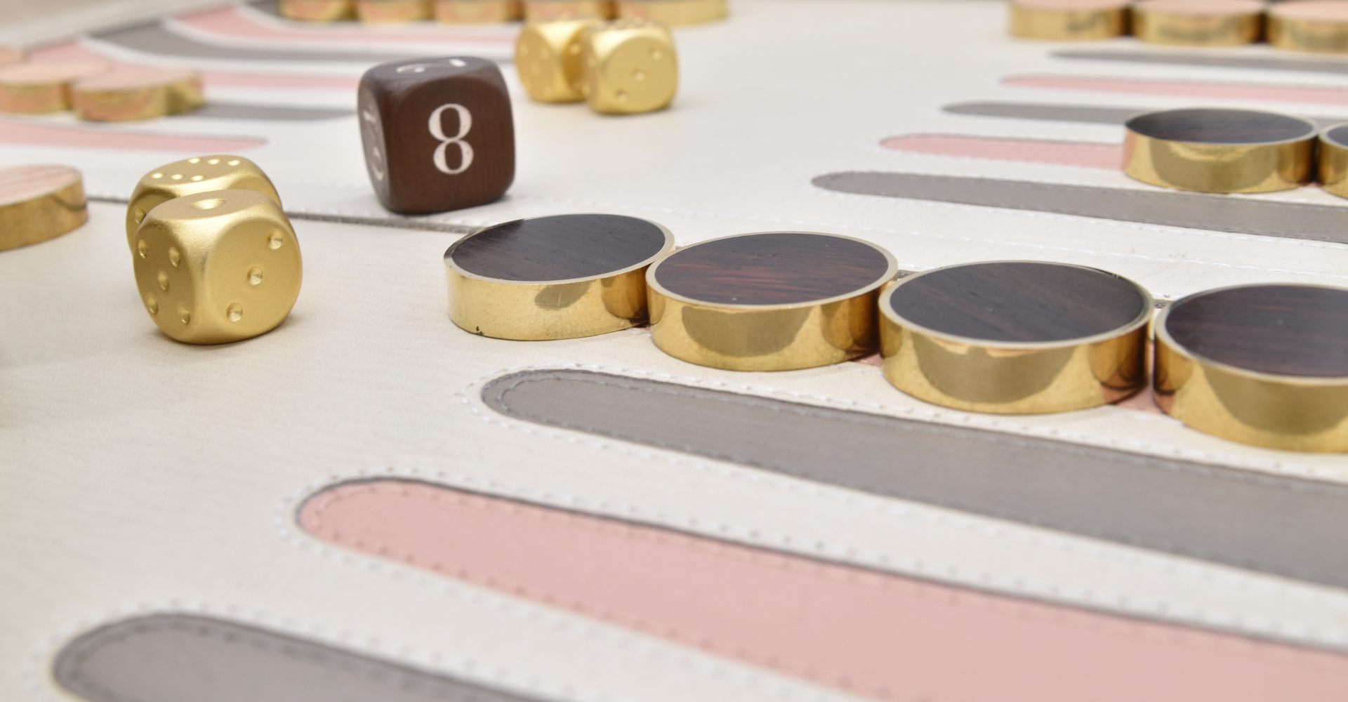 Elegant cream-colored backgammon board handcrafted with premium leather detailing. High-quality, one-of-a-kind design by Bos Backgammon. Discover luxury craftsmanship